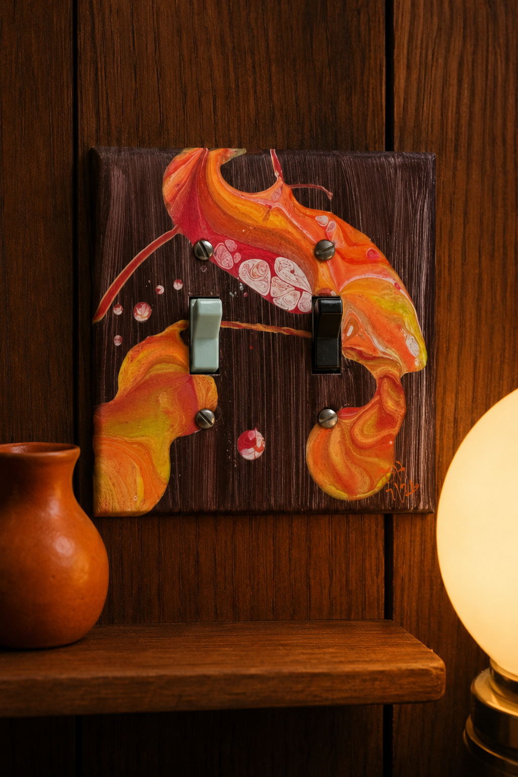 Emberwood Orbit, an original painted lightswitch cover by JD Hecht